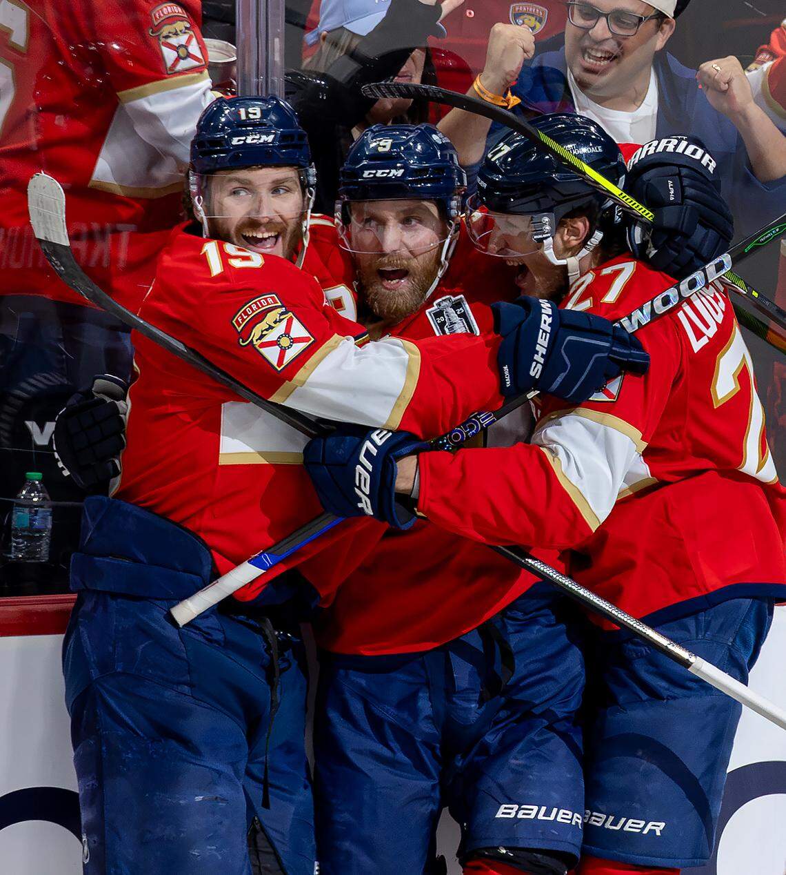 Florida Panthers center Sam Bennett (9) celebrates with teammates Matthew Tkachuk (19) and Eetu Luostarinen (27) after scoring against the Edmonton Oilers during the second period of Game 3 in the Stanley Cup Final at Amerant Bank Arena on Monday, June 9, 2025, in Sunrise, Fla.