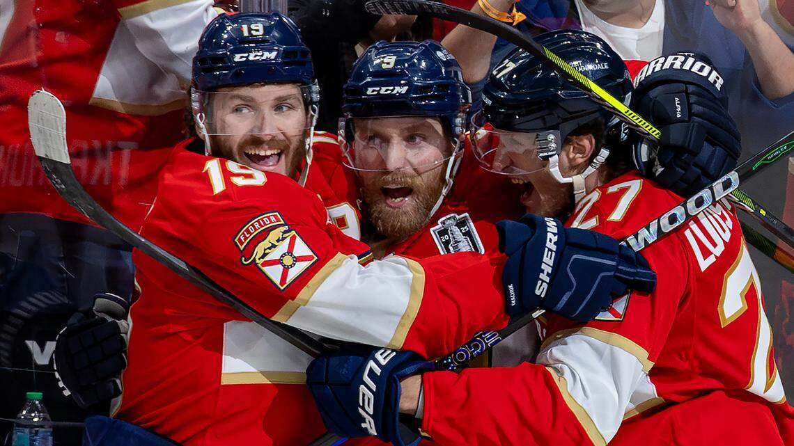 Florida Panthers center Sam Bennett (9) celebrates with teammates Matthew Tkachuk (19) and Eetu Luostarinen (27) after scoring against the Edmonton Oilers during the second period of Game 3 in the Stanley Cup Final at Amerant Bank Arena on Monday, June 9, 2025, in Sunrise, Fla.