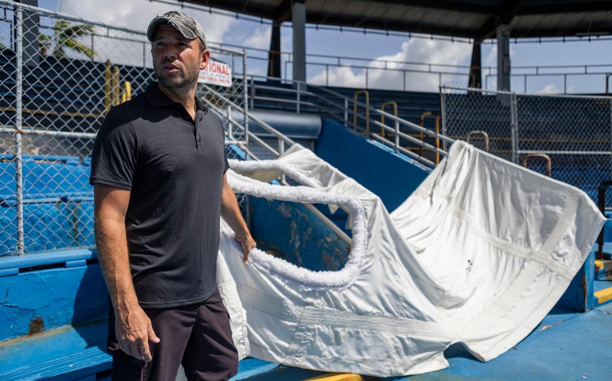 Mike Partica, a trainer at the Miami Seaquarium, talks about Lolita the killer whale, also known as Tokitae, near her stadium tank on Saturday, July 8, 2023, in Miami, Fla. After officials announced plans to move Lolita from the Seaquarium, trainers and veterinarians are now working to prepare her for the move.
