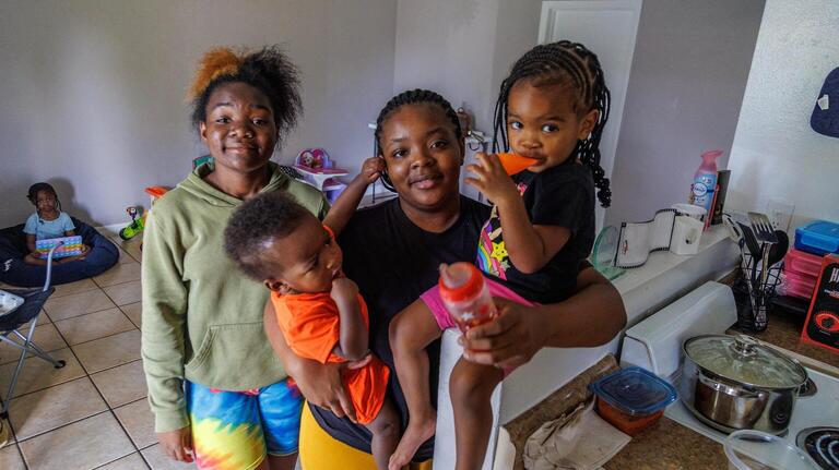 Trying to hold a family together:  Broward woman takes in young sister when their mom dies