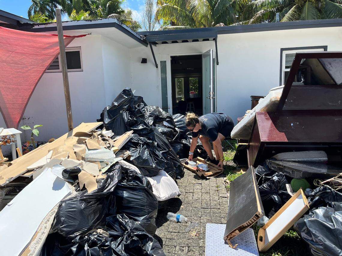 Renee Longini, a nurse anesthetist, emptied out her Fort Lauderdale home, which saw three feet of floodwater during the rainstorm. Longini said it could take four to six months to repair her house.