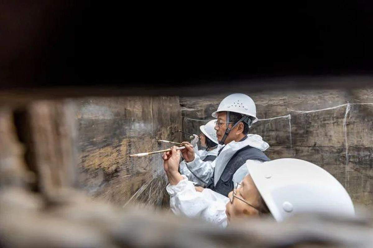 The outer chamber of the tomb had painted murals on its walls, experts said.