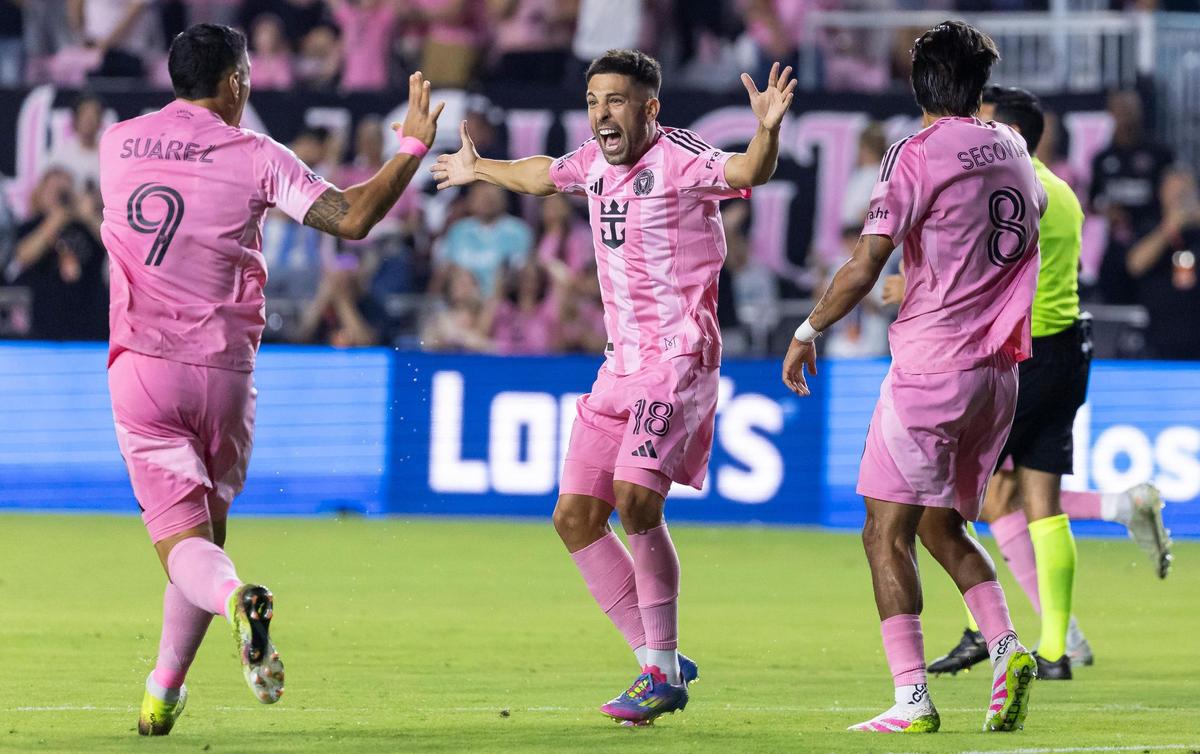 Inter Miami defender Jordi Alba (18) celebrates with forward Luis Suárez (9) after scoring a goal against Vancouver Whitecaps in the first half of their Concacaf Champions Cup Semifinals match at Chase Stadium on Wednesday, April 30, 2025, in Fort Lauderdale, Fla.