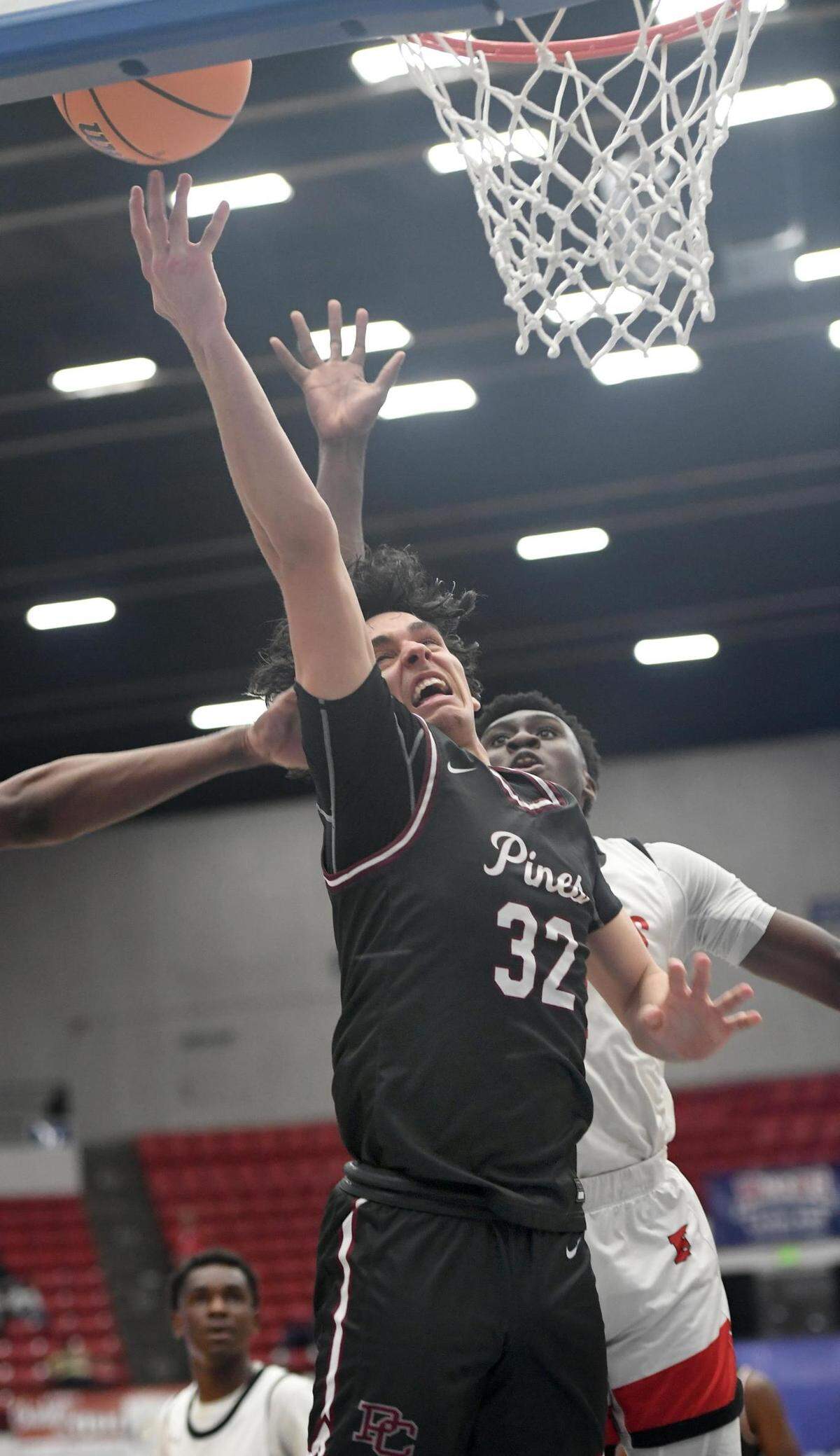 Pembroke Pines Charter’s Ramez Zayed (32) shoots against Edgewater in the Class 6A final during the Florida High School State Championships at the RP Funding Center in Lakeland, Fl on Friday March 8, 2024. Pembroke Pines Charter defeated Edgewater 59-54 to win the Class 6A State Title. Scott Wheeler | Photo