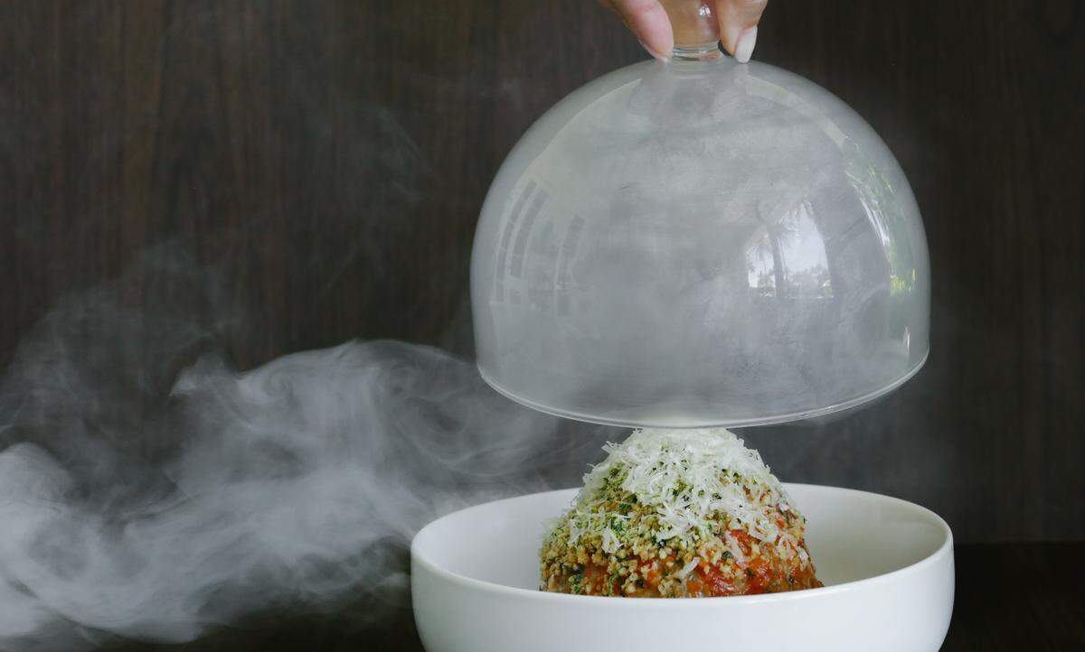 Wagyu meatball under glass at Shula’s Steak House