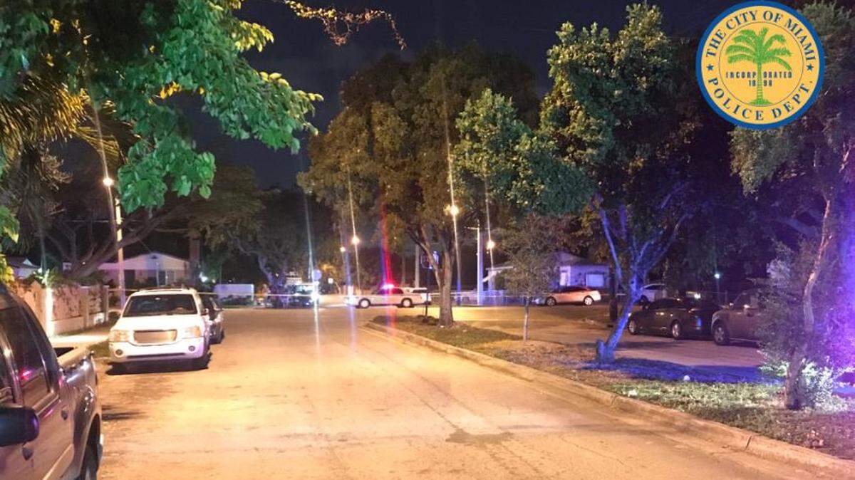 Picture of the predawn Wednesday scene at Northwest 47th Street and Fifth Avenue where a body was found.