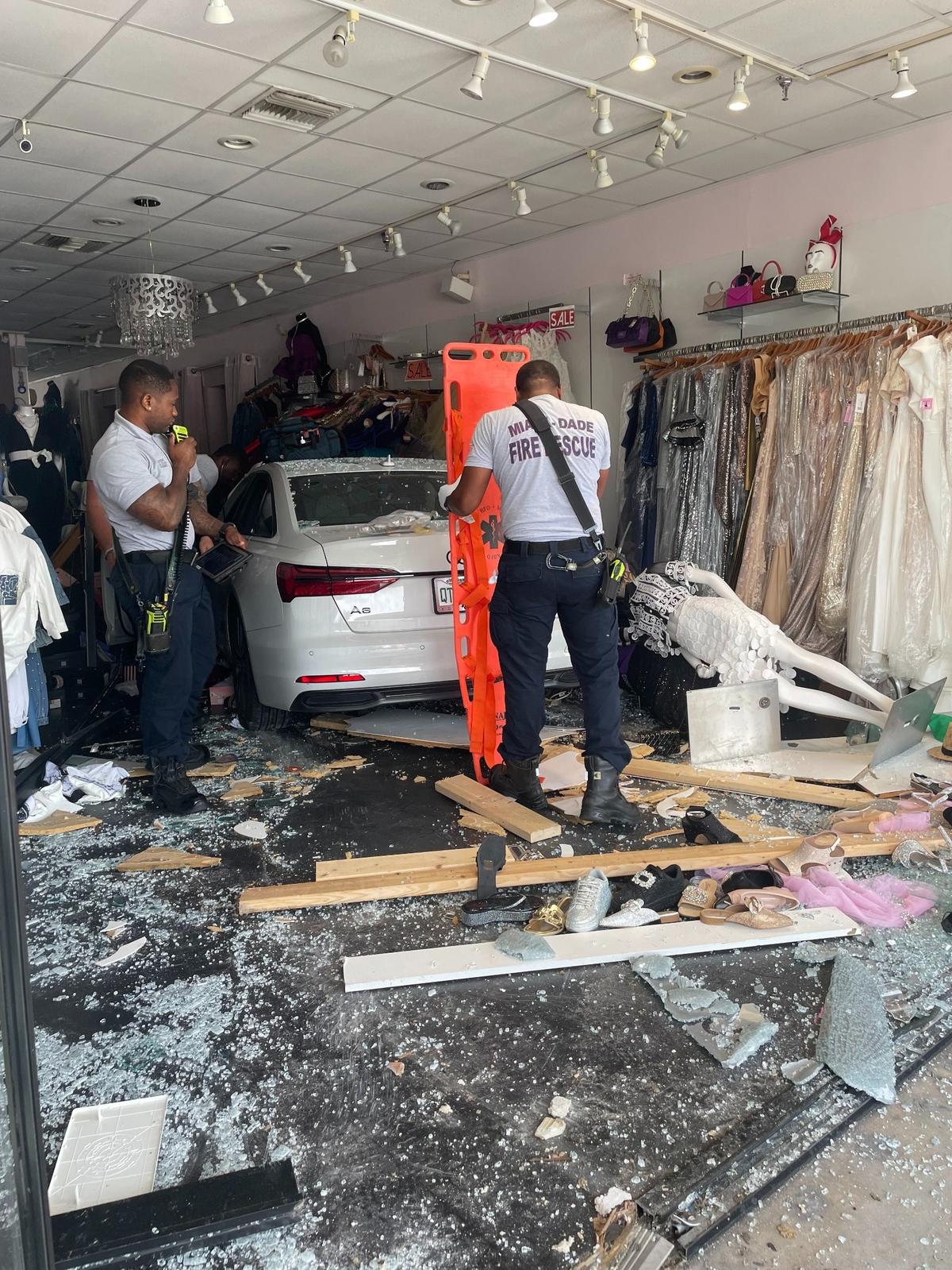 A 63-year-old woman crashed her car into JDO Couture Dress Shop in Aventura, Thursday morning Aug. 8. Photo courtesy of JDO Couture Dress Shop.