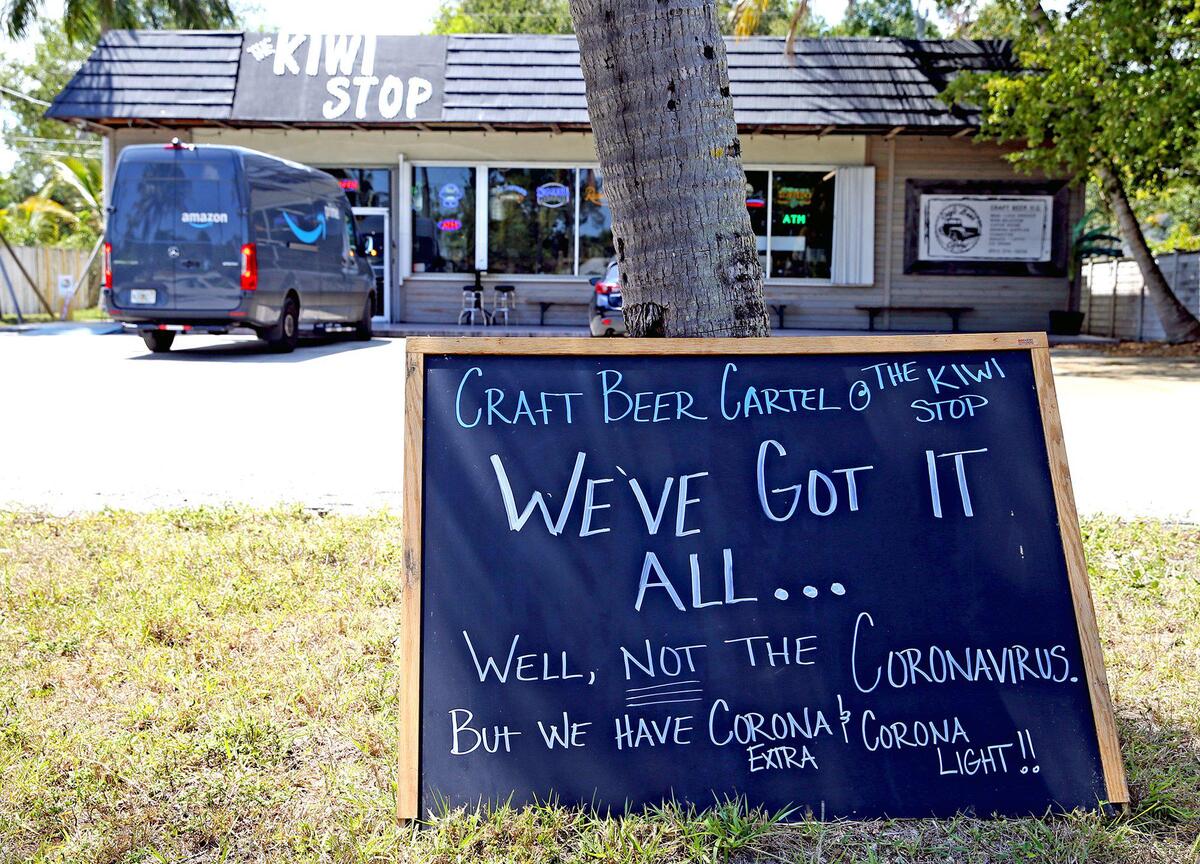 Kiwi Stop offers Corona beers and convenience store items for sale as the coronavirus outbreak impacts Fort Lauderdale, Florida, April 7, 2020.