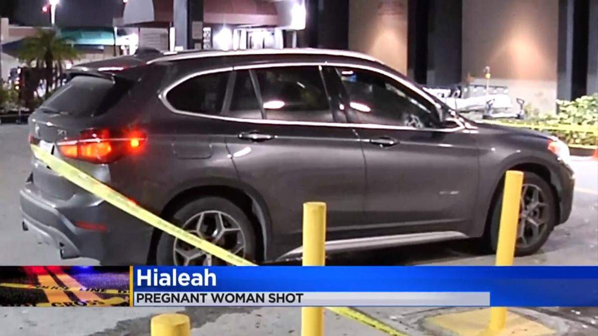 A bullet-riddled BMW with a wounded man and pregnant woman arrived at Hialeah Hospital on May 27, 2020. The vehicle is shown in a screen shot from WFOR-CBS4.