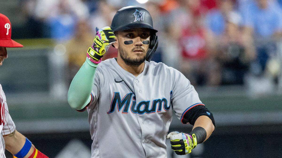 Miami Marlins’ Miguel Rojas gestures from second base after hitting an RBI-double during the fifth inning of a baseball game against the Philadelphia Phillies, Monday, June 13, 2022, in Philadelphia.