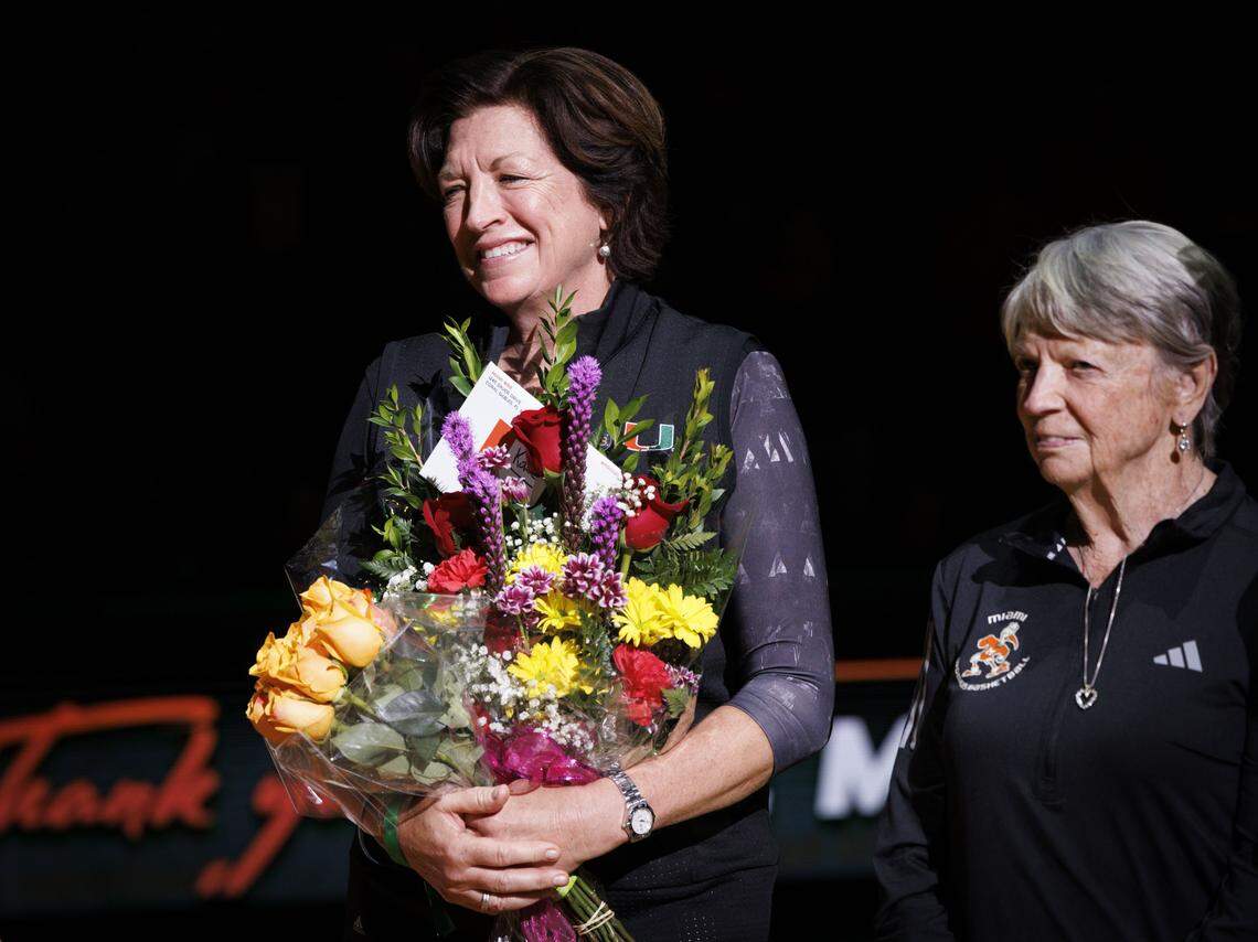 Former Miami Hurricanes Head Coach Katie Meier receives recognition for her time with the team during a halftime ceremony of a game on Thursday, Jan. 29, 2026, at Watsco Center in Coral Gables, Fla.