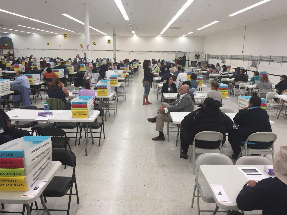 Broward County began the state-mandated manual recount late than planned Friday morning. Hundreds of volunteers reviewed tens of thousands of ballots for the U.S. Senate race.