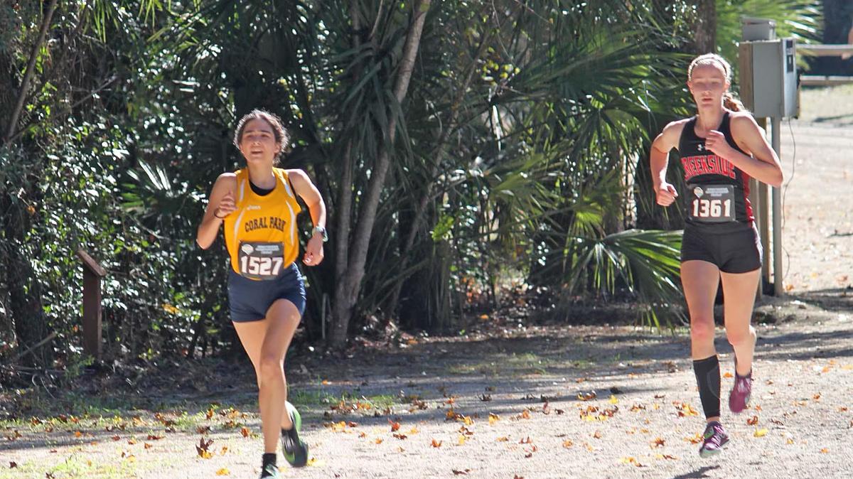 Coral Park’s Penelope Sosa, left, competes in the Class 4A state championships last year.