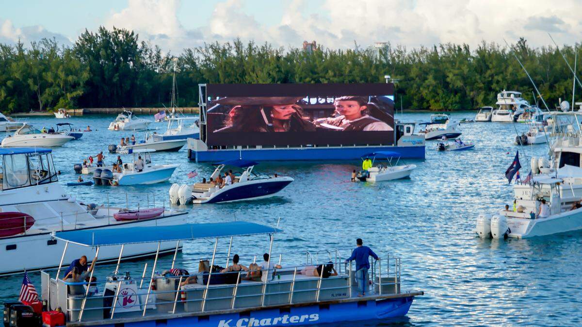You can watch movies from your boat or from nearby land as part of the floating cinema series.