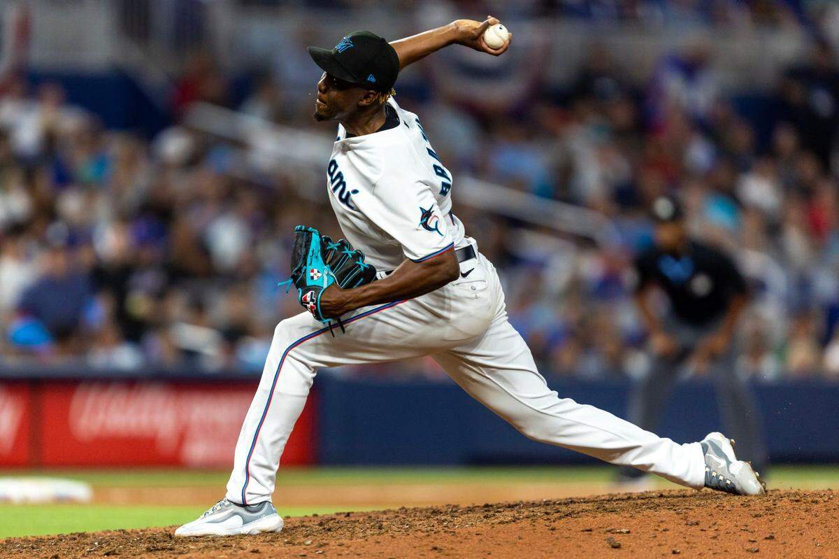 Miami Marlins pitcher Huascar Brazoban (31) throws a pitch during the ninth inning of an MLB game against the New York Mets at LoanDepot Park in Miami, Florida, on Thursday, March 30, 2023.