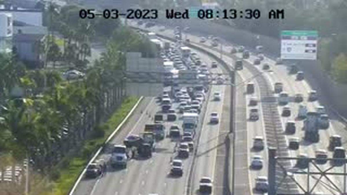 A rollover crash south of Miami Gardens Drive on I-95’s southbound side has the main line down to one lane during rush hour.