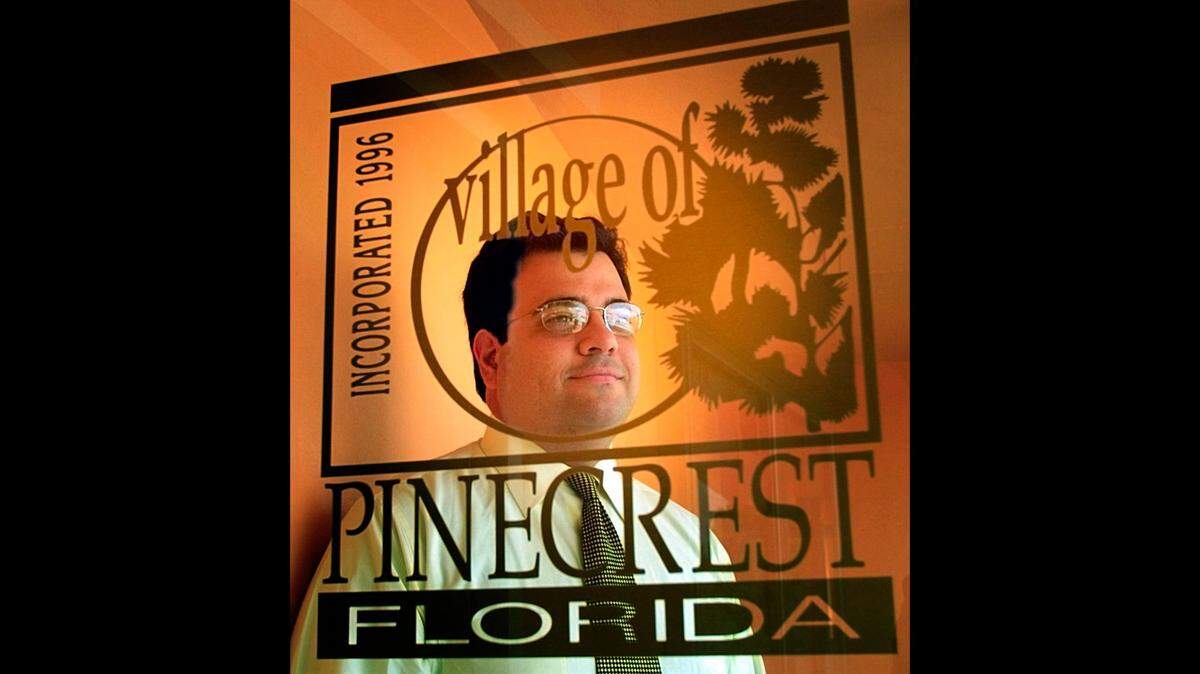 Guido H. Inguanzo Jr. was the clerk for the Village of Pinecrest since its incorporation in 1996. This is a file photo from May, 9, 2002.