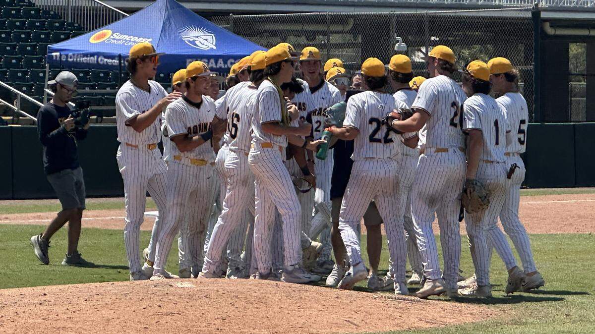 The St. Thomas Aquinas baseball team celebrates after beating Land O’Lakes 4-1 in a Class 6A state semifinal on Friday at Hammond Stadium in Fort Myers, Fla.