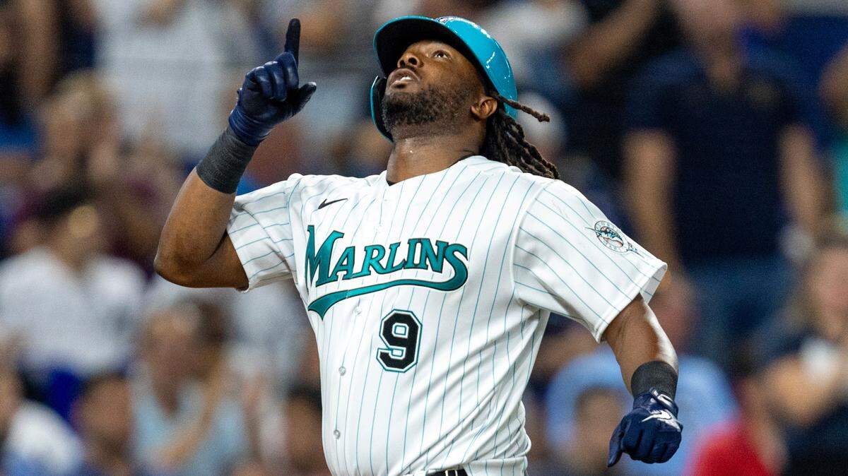Miami Marlins base runner Josh Bell (9) reacts to hitting a homerun during the sixth inning of an MLB game against the New York Yankees at loanDepot park in the Little Havana neighborhood of Miami, Florida, on Friday, August 11, 2023.