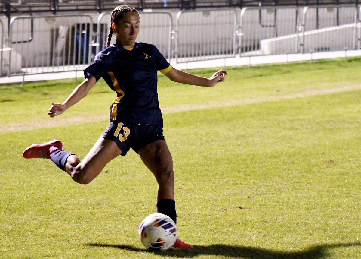 St. Thomas Aquinas junior Giuliana Kostick takes a shot on goal in the first half of the Class 6A girls soccer state championship game against St. Johns Bartram Trail on Saturday at Lake Myrtle Sports Complex.