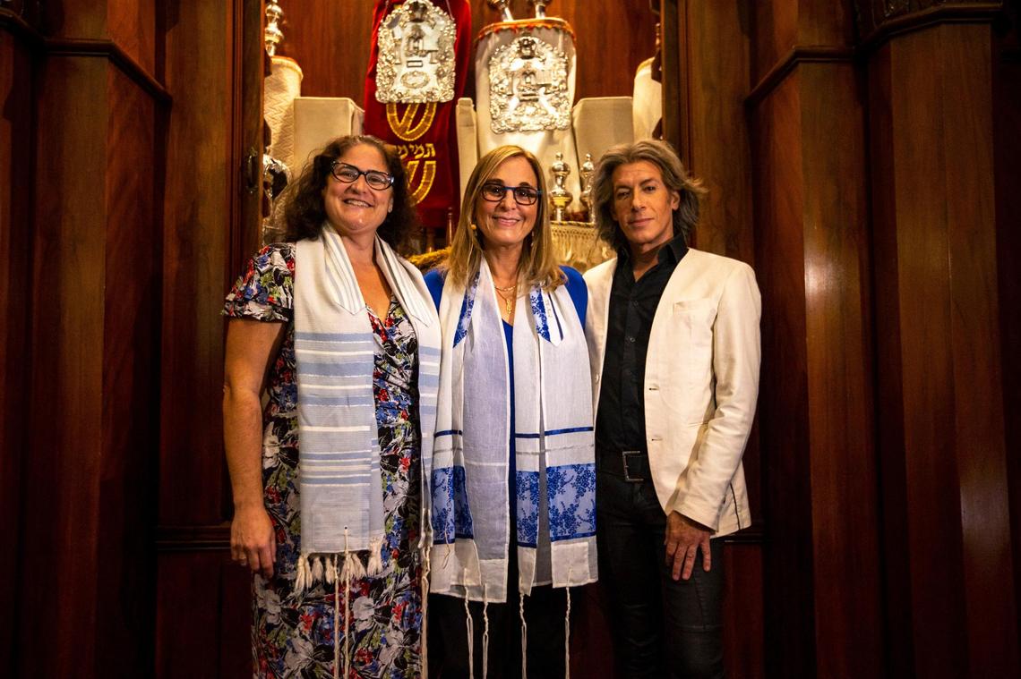 From left, Senior Rabbi Amy Morrison, Cantor Rachelle Nelson and Mark Nedlin, Board of Trustees vice president for congregational engagement, pose for a portrait on March 11, 2022, to commemorate Temple Israel of Greater Miami’s centennial.