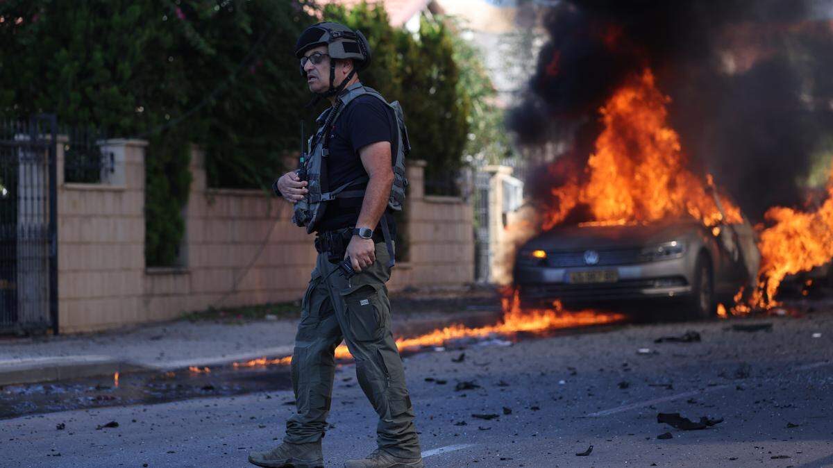 A member of the Israeli police force in Ashkelon, southern Israel on Oct. 7 after Hamas attack.