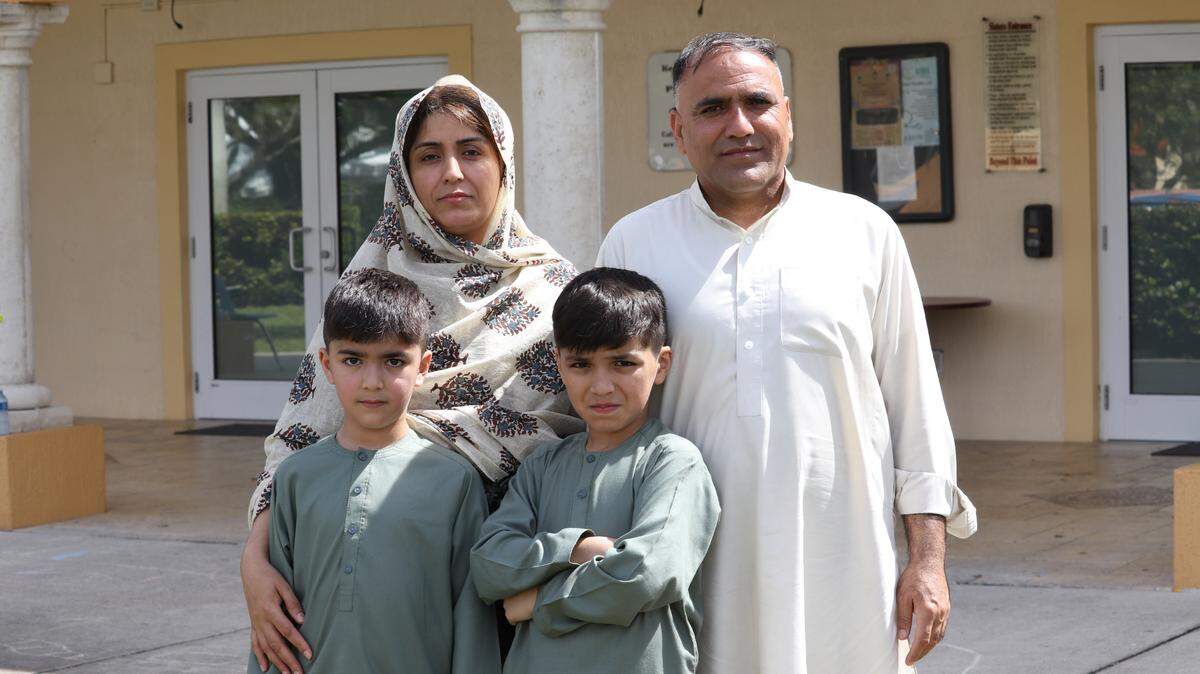 Naseema Ahmadzai, her husband Mohammad Kabir Nazari and their sons Mohammad Shaheer and Mohammad Zaheer celebrate their first Eid ul-Fitr at Masjid An-Noor, the mosque connected to the Islamic School of Miami in West Kendall on Monday, May 2, 2022. They came to South Florida from Afghanistan, where they fled after the U.S. pulled out its troops last year after a 20-year war.