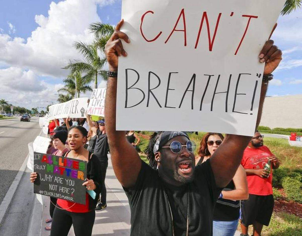 Sammy Jack of Miami protests as New Day Revolution hosts a Black Lives Matter Miami rally at Miami Gardens City Hall on Saturday, July 16, 2016.