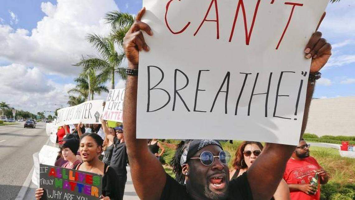 Sammy Jack of Miami protests as New Day Revolution hosts a Black Lives Matter Miami rally at Miami Gardens City Hall on Saturday, July 16, 2016.