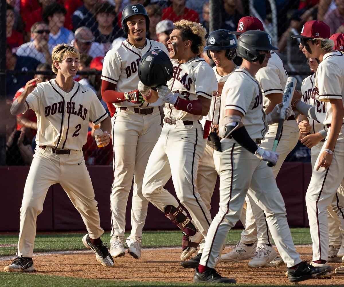 Marjory Stoneman Douglas’ Alex Rodriguez (13) reacts after hitting a home run against Christopher Columbus in the second inning of their Region 4-7A baseball game final at Anthony Rizzo Field on Tuesday, May 16, 2023, in Parkland, Fla.
