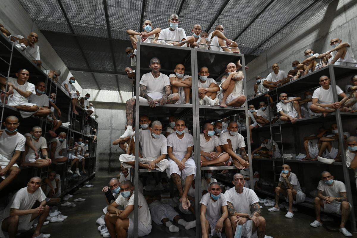 Inmates remain in a cell at the Counter-Terrorism Confinement Centre (CECOT) mega-prison in El Salvador, where hundreds of members of the MS-13 and 18 Street gangs are being held, in Tecoluca, El Salvador on January 27, 2025. (Photo by Marvin RECINOS / AFP) (Photo by MARVIN RECINOS/AFP via Getty Images)