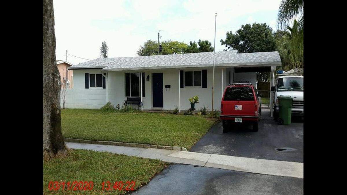 Edgar Dubray owned this Pembroke Pines house and wanted his brother evicted. Police removed Donald Dubray Monday after arresting him for Edgar Dubray’s murder.