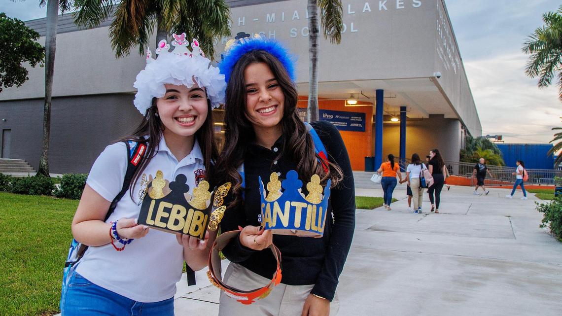 Amanda Soto (left) and Natalie Crespo wear senior crowns for first day at Hialeah-Miami Lakes Senior High School on Thursday, Aug. 17, 2023.