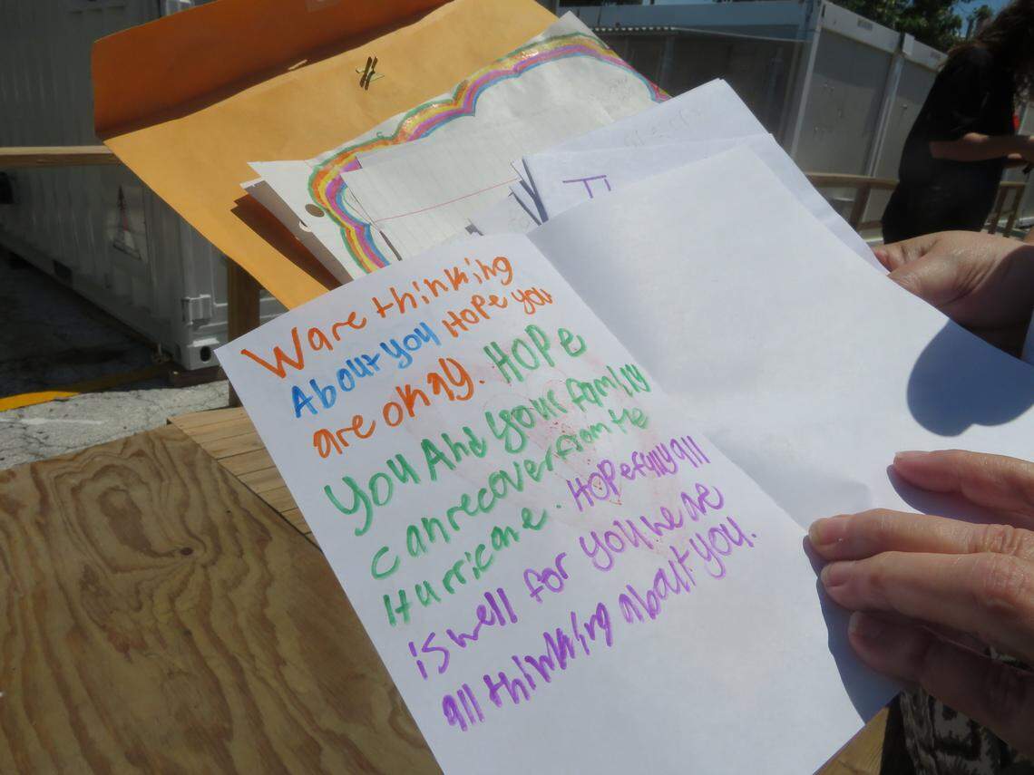Hospital officials view letters from students at Fowlerville Junior High School in Michigan on Tuesday, June 5, 2018. An eighth-grade class at the school raised $250 and sent it to Fisherman's Community Hospital in Marathon to help it rebuild after Hurricane Irma.