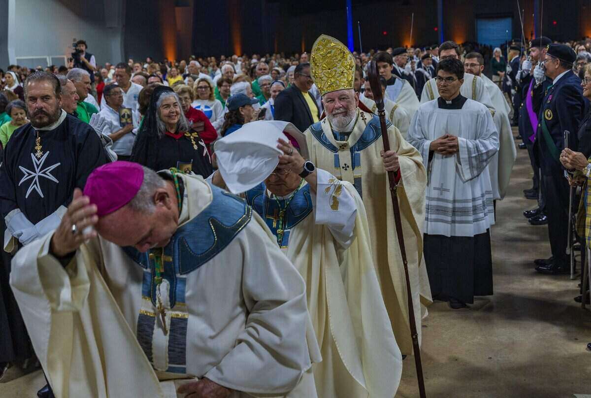 Members of the clergy including Reverend Thomas Wenski, Archbishop of Miami walked to the altar during the celebration of a Solemn Mass celebrating the 65th Anniversary of the Arrival of the Image of Our Lady of Charity in Miami, celebrated at the Miami-Dade Fair & Exposition, in West Miami, on Tuesday September 08, 2026.
