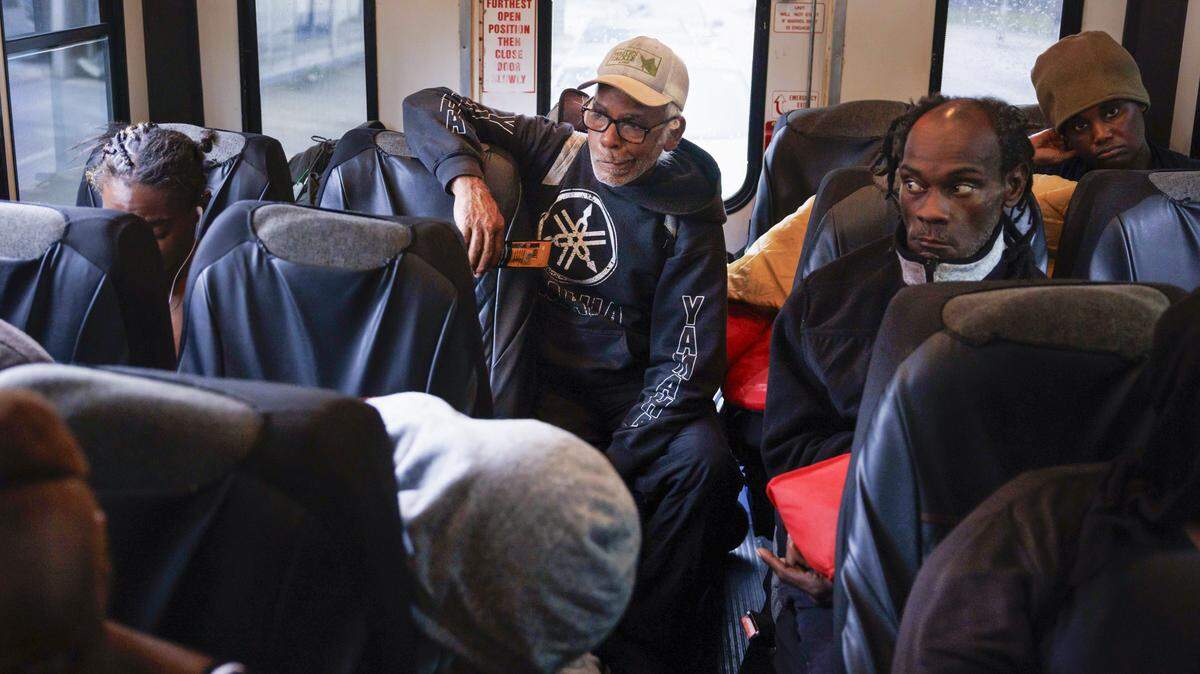 People ride on the bus run by Rotary Connection, a nonprofit initiative that offers free bus transportation to social services around the city, to LifeNet4Families on Monday, Jan. 12, 2026, in Fort Lauderdale, Fla. 