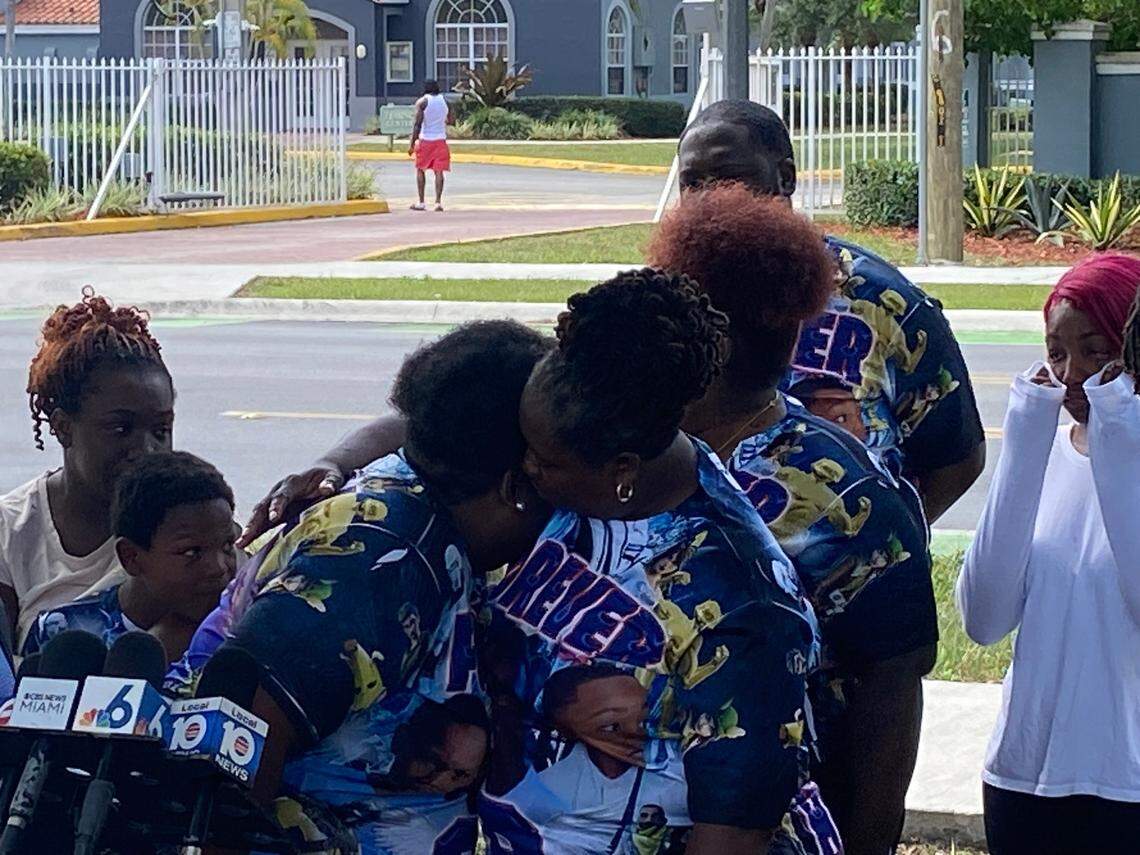 Teretha Williams embraces her daughter, Shanika Williams, in a field in Florida City Tuesday, April 22, 2025, during an announcement of a lawsuit over the death of Shanika’s son Antavious Scott, who was shot and killed Nov. 16, 2024.