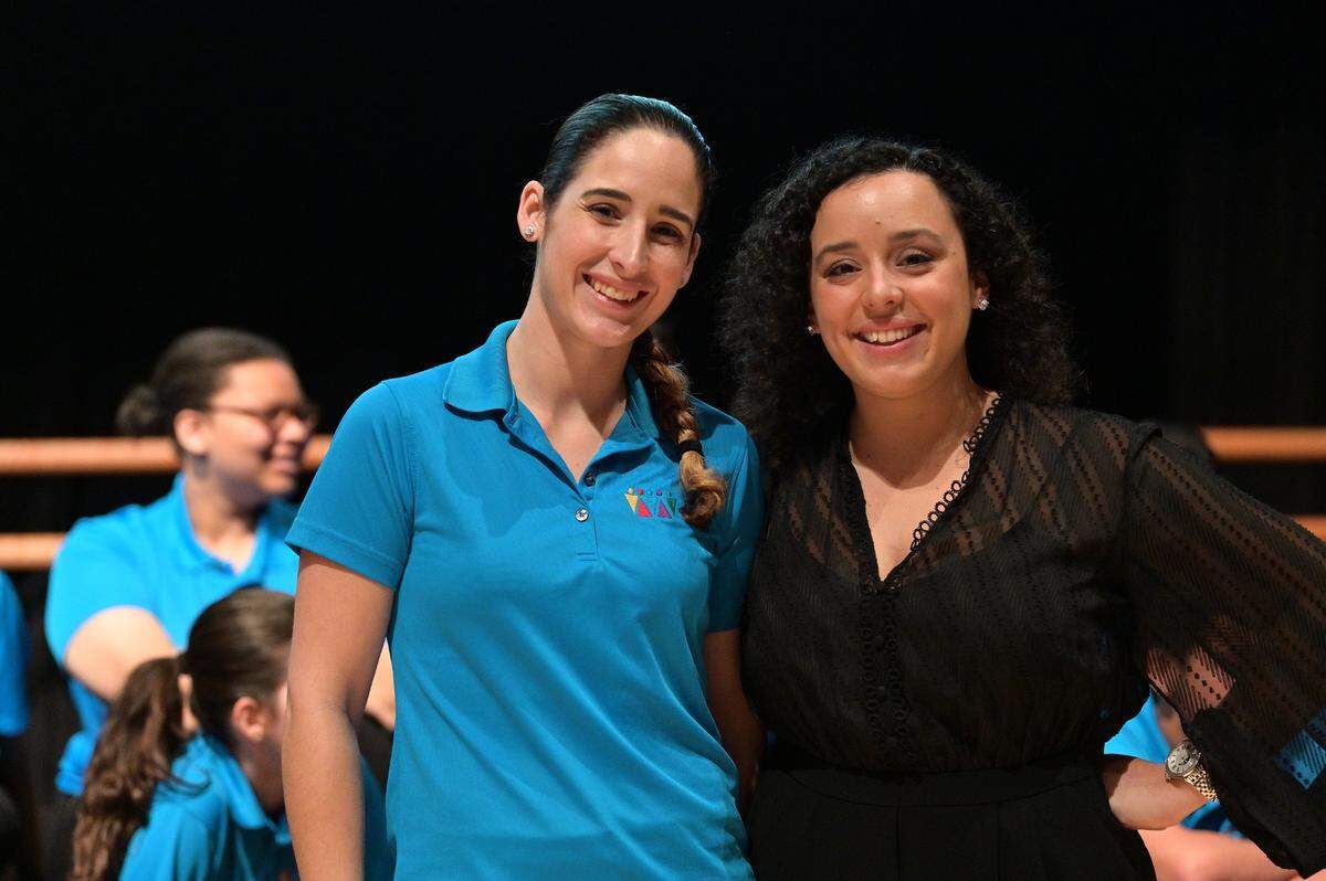 Miami Children’s Chorus executive director Annie Mendez, left, and artistic director Liana Salinas, right, sang in the chorus when they were children.
