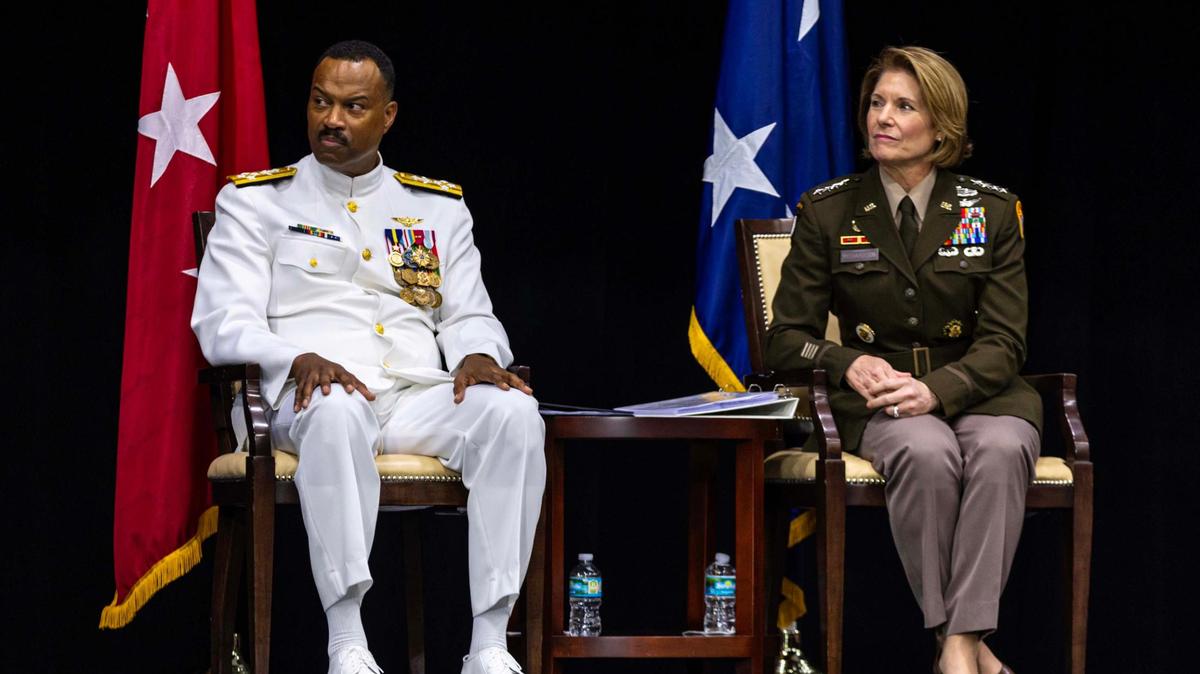 U.S. Navy Admiral Alvin Holsey, left, and U.S. Army General Laura J. Richardson, right, look on as they listen to U.S. Secretary of Defense Lloyd J. Austin III speak during a change of command ceremony at the U.S. Southern Command on Thursday, November 7, 2024, in Doral