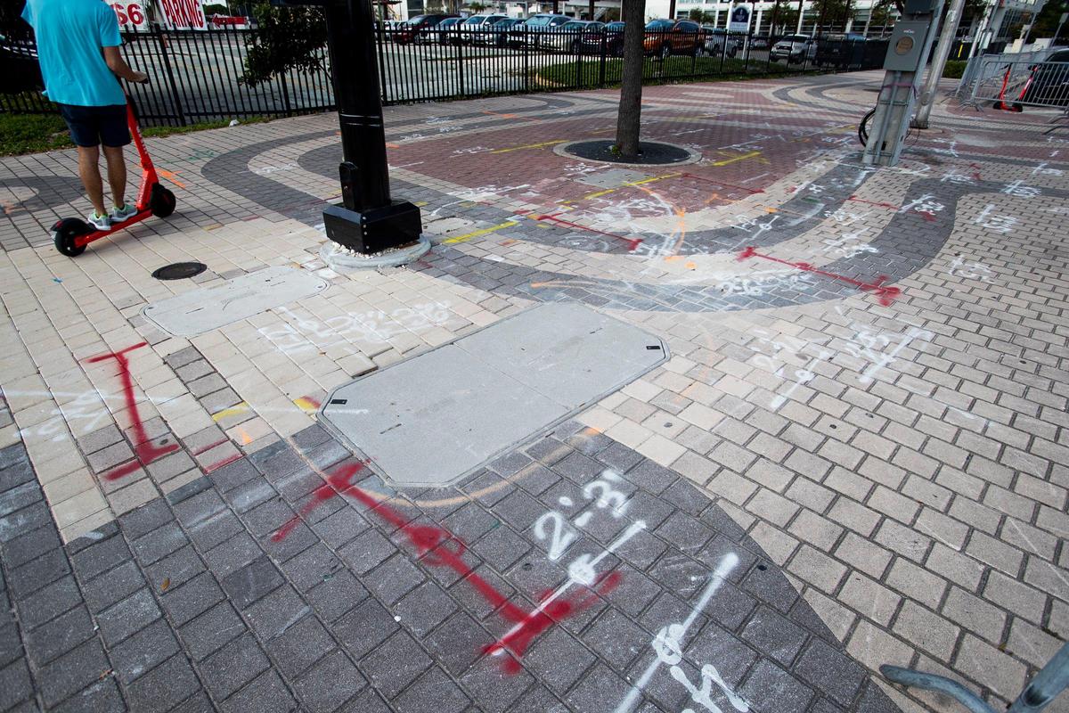 Spray-painted markings for underground utilities and new pole installations along Biscayne Boulevard have defaced the showcase artistic pavers designed by Brazilian landscape architect Roberto Burle Marx.