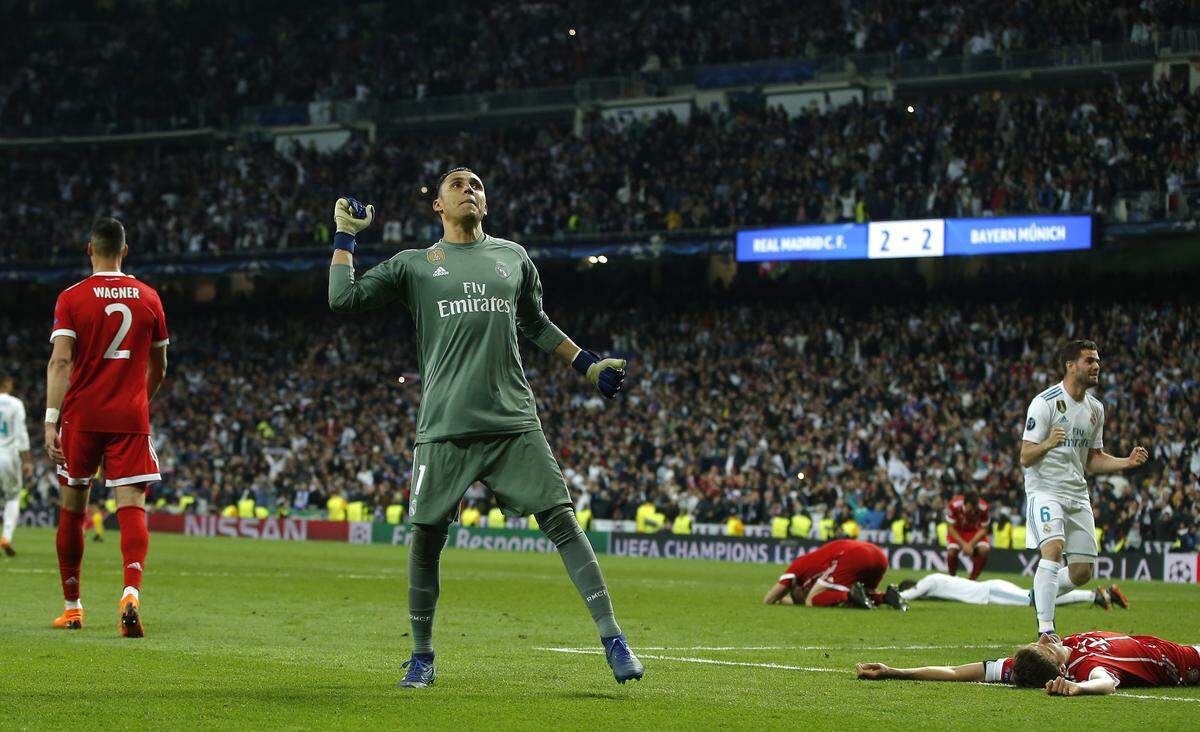 Real Madrid's goalkeeper Keylor Navas, center, celebrates after Madrid reached its third straight Champions League final 4-3 on aggregate at the Champions League semifinal second leg soccer match between Real Madrid and FC Bayern Munich at the Santiago Bernabeu stadium in Madrid, Spain, Tuesday, May 1, 2018. (AP Photo/Paul White)