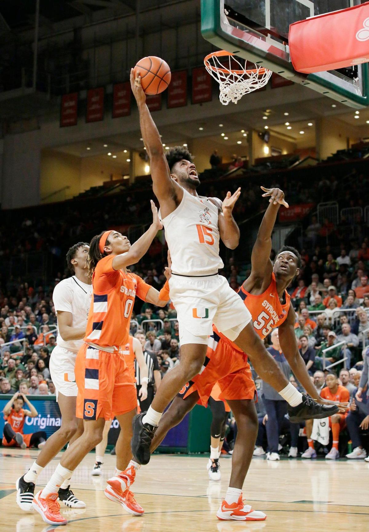 UM Hurricanes Norchad Omier (15) hoots against Syracuse Orange during NCAA men’s basketball game on Monday, January 16, 2023 at Watsco Center in Coral Gables. Andrew Uloza / for Miami Herald
