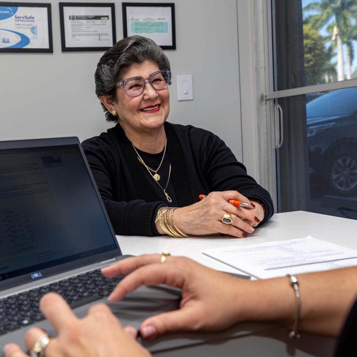 Alzheimer study participant Irma Mendoza reacts as she answers questions during a community outreach event for the John P. Hussman Institute for Human Genomics where UM researchers performed tests, enrolled new participants and took genetic samples to a new Biorespository opening on UHealth’s campus, at Hora Feliz Adult Day Care on Thursday, January 16, 2025, in Hialeah, Fla.
