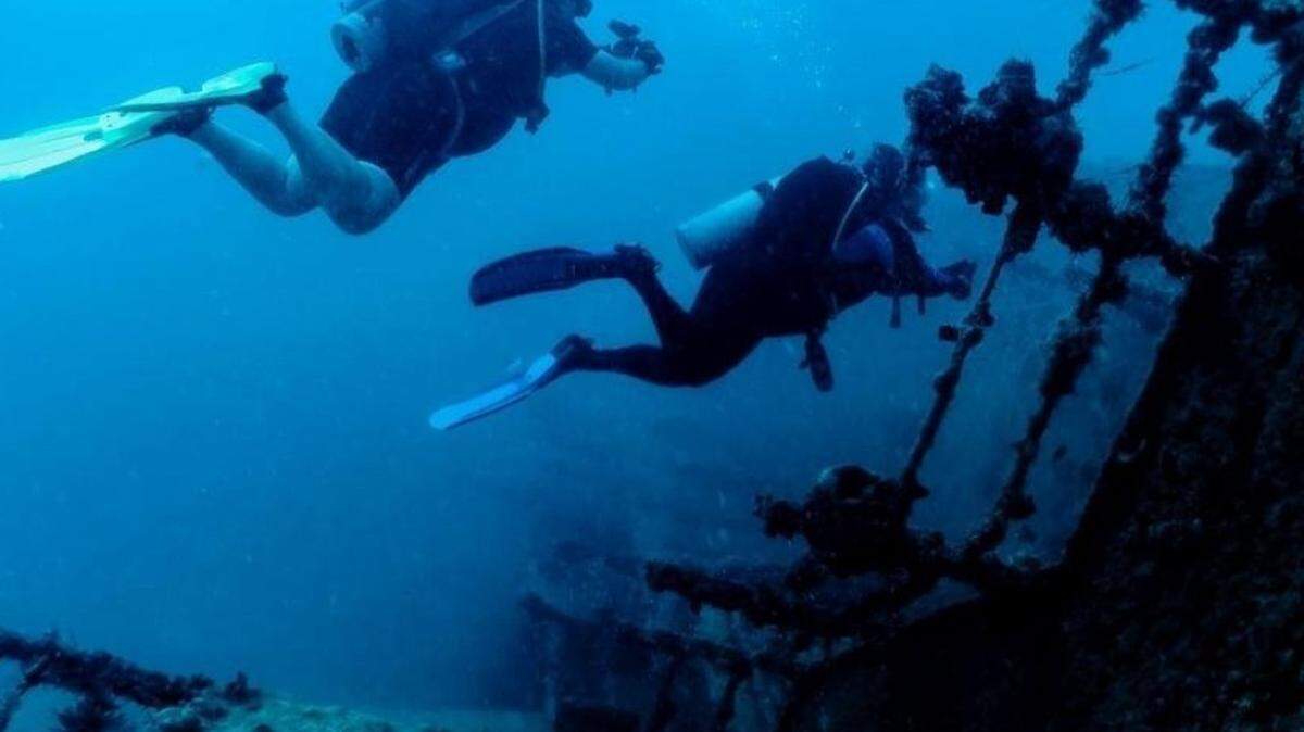 Scuba divers swim above the deck of the Eagle off Islamorada in the Florida Keys in 2018.