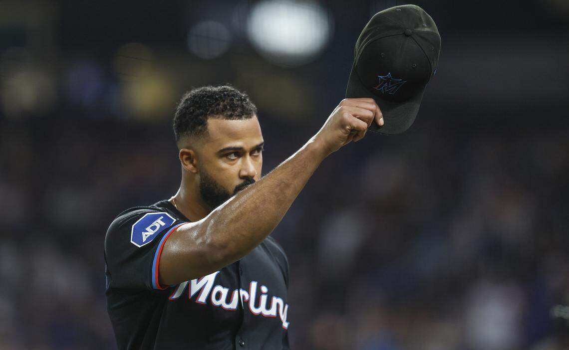 Miami Marlins pitcher Sandy Alcantara (22) tips his hat as he ackowledges the crowd in the eighth inning during the MLB game against the New York Mets at loanDepot Park in Miami, Florida, on Friday, September 26, 2025.
