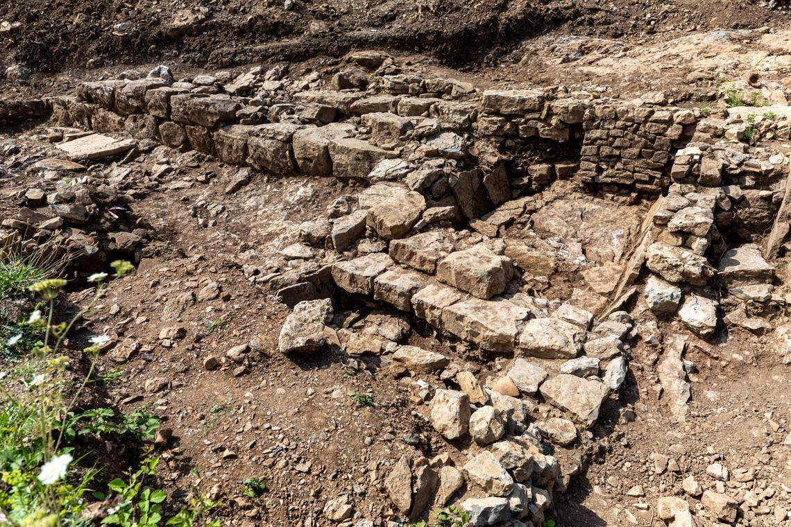The homes were built into the hill with water management in mind, archaeologists said.