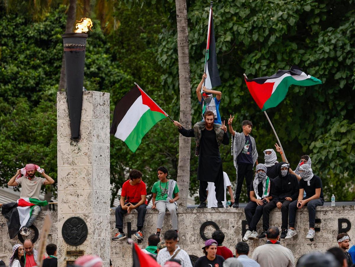 Demonstrators rally in support of Palestinians in Gaza during the conflict between Israel and Hamas at the Torch of Friendship in Bayfront Park in Miami on Friday, October 13, 2023.
