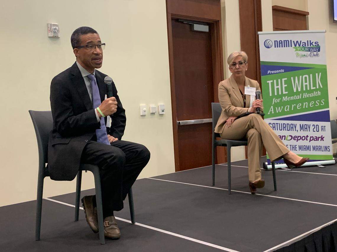 Dr. Stephen McLeod-Bryan, left, a University of Miami clinical associate professor and the president-elect of Black Psychiatrists of America, and Dr. Patricia Junquera, interim chair and associate professor of the department of psychiatry and behavioral health at Florida International University, discuss how mental health and suicide impacts Black and Hispanic communities in South Florida during NAMI Miami-Dade’s first South Florida Suicide Awareness conference at the University of Miami on Saturday, March 4, 2023.