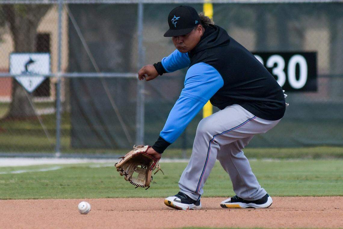 Miami Marlins utility player Willians Astudillo fields a ground ball during a spring training workout on Wednesday, March 30, 2022, at the Roger Dean Chevrolet Stadium complex in Jupiter, Florida.