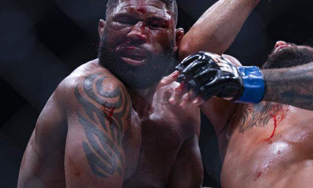 Curtis Blaydes of the United States and Josh Hokit of the United States fight in their heavyweight bout at UFC 327 at the Kaseya Center on Saturday, April 11, 2026, in downtown Miami, Fla.